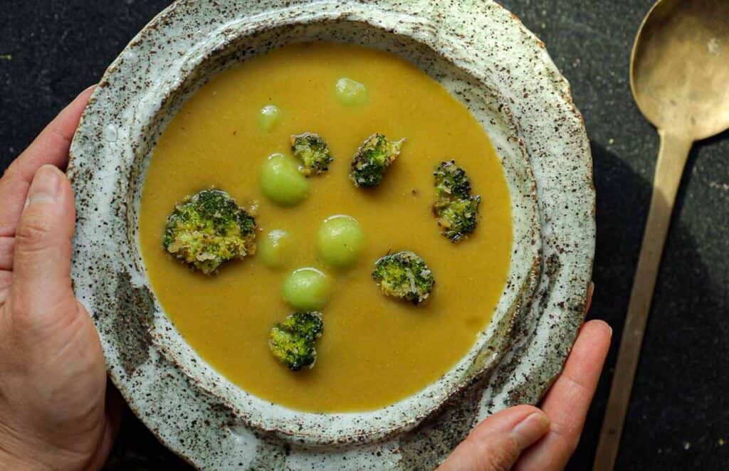 hero image of creamy broccoli soup.